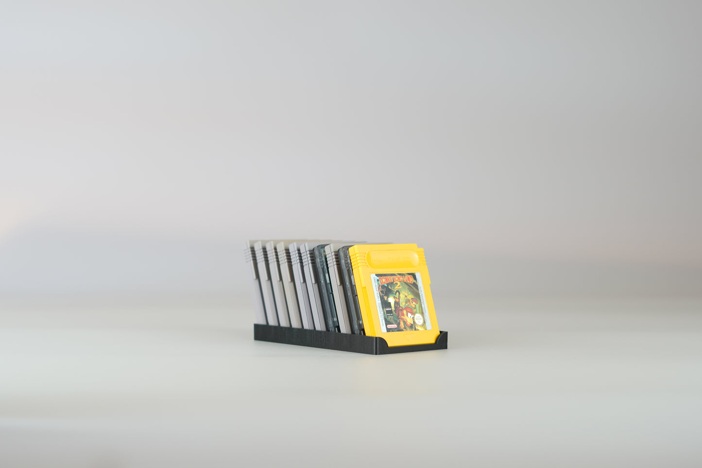 Aufsteller, Displayständer für 10 Nintendo Gameboy Spiele Module