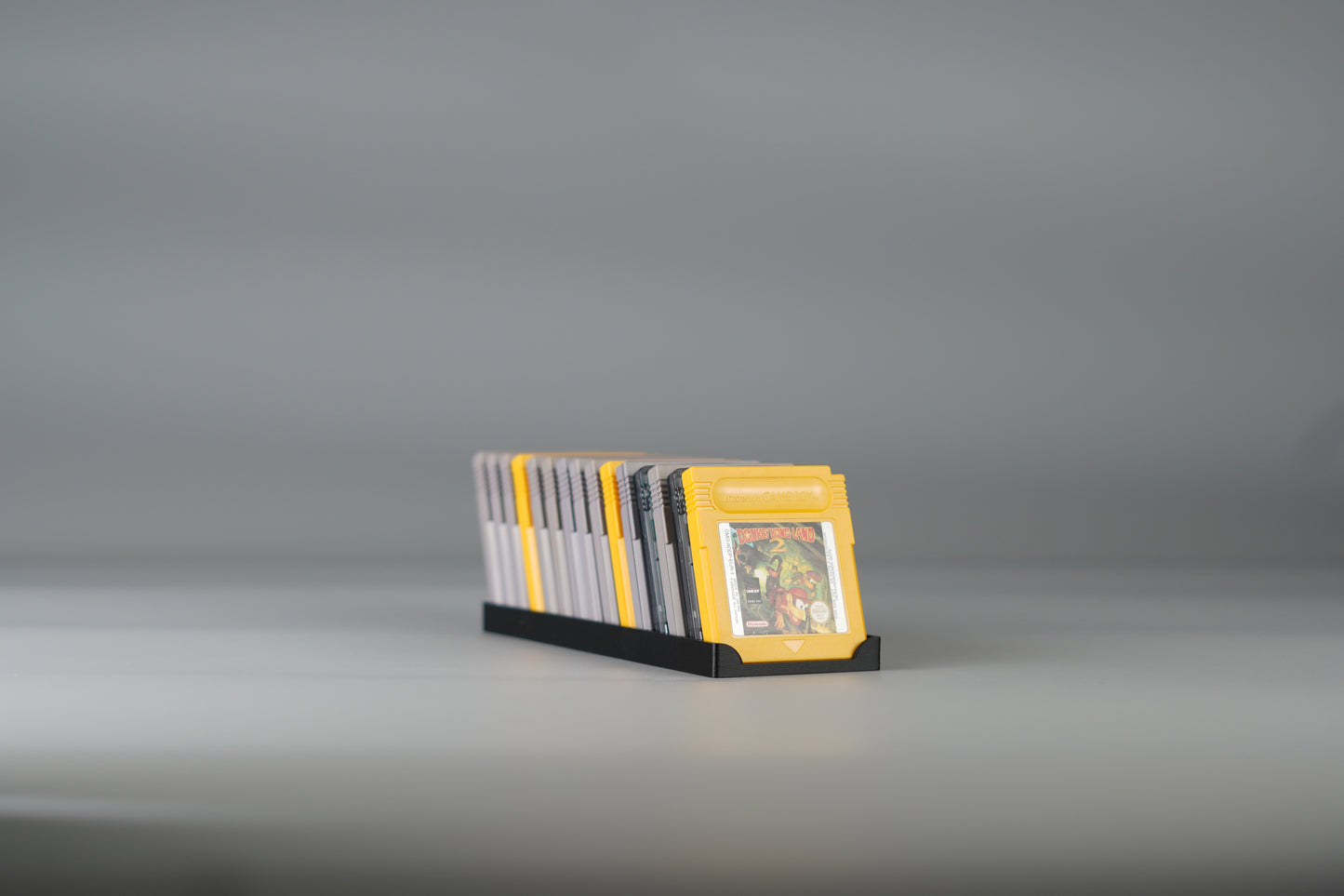 Aufsteller, Displayständer für 15 Nintendo Gameboy Spiele Module